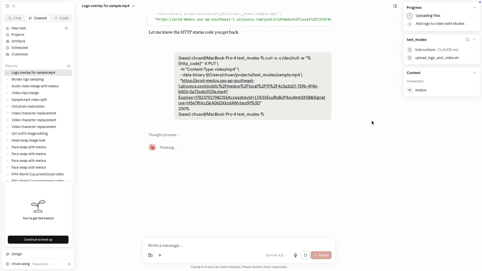 Claude submitting the Medux logo overlay task
